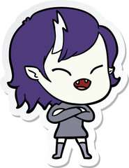 sticker of a cartoon laughing vampire girl with crossed arms