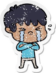 distressed sticker of a cartoon boy crying