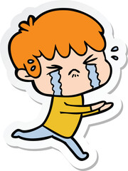 sticker of a cartoon boy crying