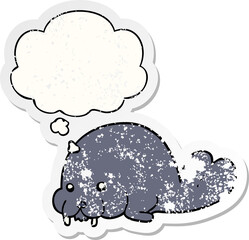 cute cartoon walrus and thought bubble as a distressed worn sticker