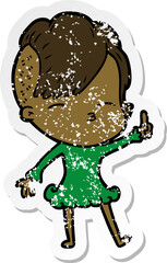 distressed sticker of a cartoon squinting girl