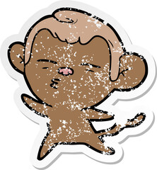 distressed sticker of a cartoon suspicious monkey