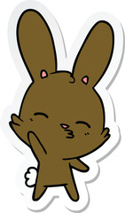 Fototapeta na wymiar sticker of a curious waving bunny cartoon