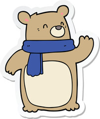 sticker of a cartoon bear wearing scarf