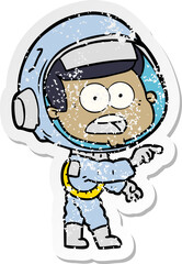 distressed sticker of a cartoon surprised astronaut