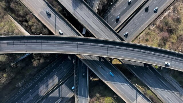 Rush Hour Vehicles Driving on a Motorway Interchange UK Aerial View