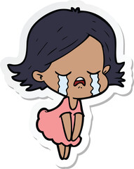 sticker of a cartoon girl crying