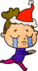 textured cartoon of a crying woman wearing santa hat