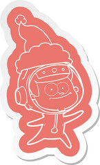 happy astronaut cartoon  sticker of a wearing santa hat