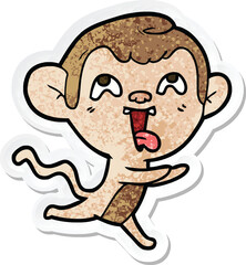 sticker of a crazy cartoon monkey running