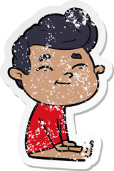 distressed sticker of a happy cartoon man sitting