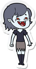 sticker of a cartoon laughing vampire girl