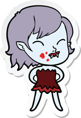 sticker of a cartoon vampire girl with blood on cheek