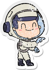 distressed sticker of a happy cartoon astronaut man