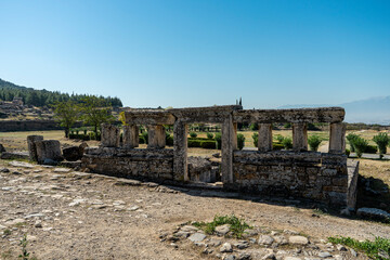 Travertine lahids in northern Necropolis of Hierapolis near Pamukkale, Denizli. Old grave monuments, tumulus graves. Copy space for text. 