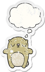 cartoon bear and thought bubble as a distressed worn sticker