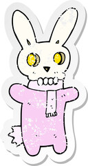 retro distressed sticker of a cartoon spooky skull rabbit