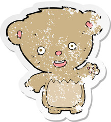 retro distressed sticker of a cartoon teddy bear waving