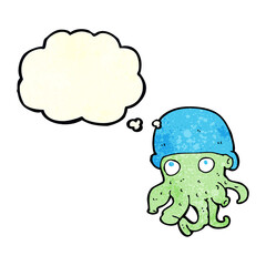 cartoon alien head wearing hat with thought bubble