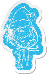 cartoon distressed sticker of a pretty astronaut girl giving thumbs up wearing santa hat
