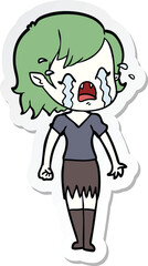 sticker of a cartoon crying vampire girl