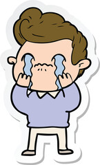 sticker of a cartoon man crying