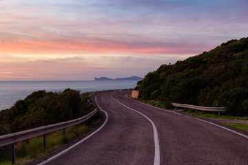Scenic Highway on the Sea Coast during Sunny Fall Season Sunset. Sardinia, Italy. Adventure Travel