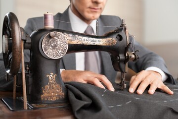 Traditional handicraft work on sewing machine and make cloth