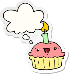cartoon cupcake with candle and thought bubble as a printed sticker