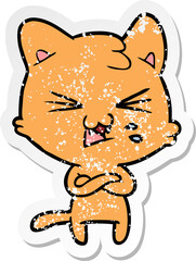 distressed sticker of a cartoon hissing cat