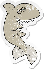 retro distressed sticker of a cartoon laughing shark
