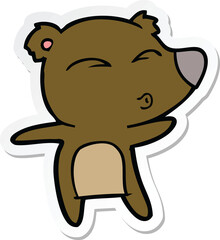 sticker of a cartoon whistling bear