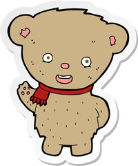 sticker of a cartoon teddy bear waving