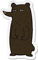 sticker of a funny cartoon black bear