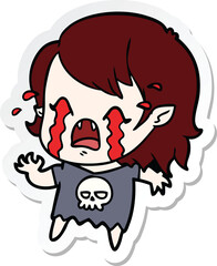 sticker of a cartoon crying vampire girl
