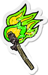 Fototapeta premium retro distressed sticker of a cartoon burning torch