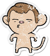 distressed sticker of a cartoon suspicious monkey