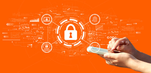 Internet network security concept with person using a smartphone on a orange background