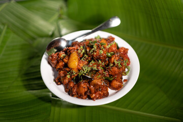 A serving of 'gobi 65', a vegetarian dish made from fried cauliflower and based on the 'gobi chicken' recipe originating from southern India.