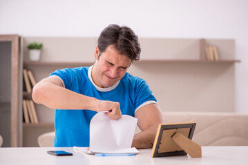 Young man in unhappy love concept