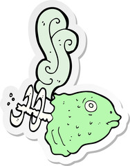 sticker of a cartoon smelly old fish head