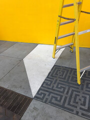 Yellow Ladder and Yellow Wall