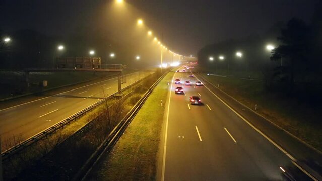 Full HD time lapse footage of cars passing on motorway in Germany at night