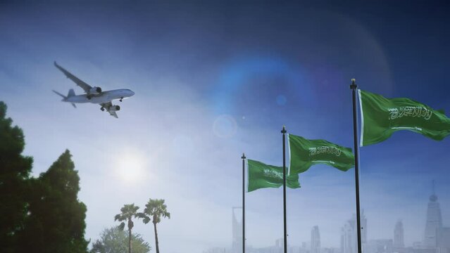 Airplane landing in Riyadh, Saudi Arabia. A generic passenger plane lowering its landing gears approaching an airport in Riyadh city. Saudi flag waving in front of city skyline.
