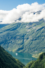 Fototapeta na wymiar The Geirangerfjord inspires with its mighty rock faces