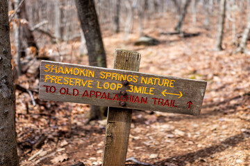Wintergreen, Virginia ski resort in Blue Ridge mountains with sign for Shamokin Springs Nature Preserve Loop hiking to old Appalachian trail and mile count