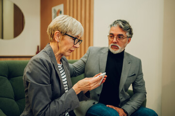 Senior couple on a therapy session in a psychologist office