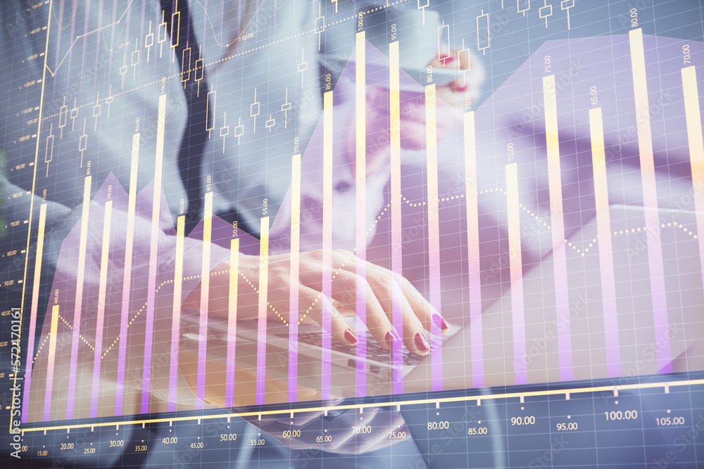 Poster double exposure of businesswoman hands typing on computer and financial graph hologram drawing. stoc