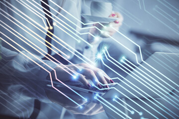 Multi exposure of woman hands working on computer and data theme hologram drawing. Tech concept.