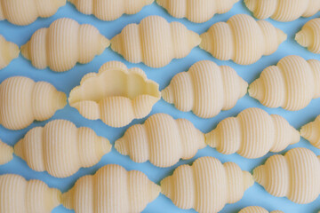 Pasta on a blue background - texture, pattern
